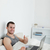 Portrait of a man purchasing online with thumb up in his bedroom stock photo © wavebreak_media