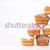 Muffins lined up against a white background stock photo © wavebreak_media