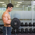 Shirtless muscular man lifting barbell in gym stock photo © wavebreak_media