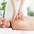 Blonde smiling woman relaxing on a lounger during massage in a wellness center stock photo © wavebreak_media