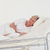 Relaxed senior woman lying on a bed stock photo © wavebreak_media