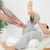 Woman stretching her leg while a man is massaging her in a room stock photo © wavebreak_media
