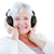 uśmiechnięty · starszy · kobieta · słuchania · muzyki · słuchawki - zdjęcia stock © wavebreak_media