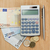 Money with pen and pocket calculator on a desk stock photo © wavebreak_media