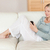 Young woman on the sofa reading text message on her smartphone stock photo © wavebreak_media