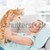 Happy blonde with pet cat on sofa stock photo © wavebreak_media