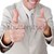 Close-up of a happy businessman with thumb up stock photo © wavebreak_media