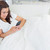 Woman lying on the couch while texting on her mobile phone stock photo © wavebreak_media
