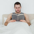 Portrait of a man reading a novel in his bedroom stock photo © wavebreak_media