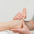 Hands of a physiotherapist massaging a foot in a room stock photo © wavebreak_media