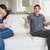 Two people sitting on the couch in the living room fighting stock photo © wavebreak_media