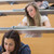 Students sitting at the lecture hall while learning  stock photo © wavebreak_media