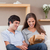 Young couple on the couch with parcel stock photo © wavebreak_media