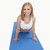 Portrait of happy woman doing push-ups on exercise mat stock photo © wavebreak_media