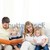Parents and their children on sofa with puppy stock photo © wavebreak_media