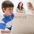 Young boy playing computer games with his family behind him stock photo © wavebreak_media