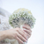 Bride holding Biedermeier Bouquet stock photo © x3mwoman