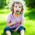 criança · piquenique · feliz · alimentação · pirulito · grama · verde - foto stock © Yaruta