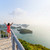 nő · turista · csúcs · sziget · erkély · kilátás - stock fotó © Yongkiet