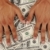 Dollars background, human hands stock photo © zurijeta