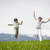 Boy and girl running and jumping on spring field in Alps stock photo © zurijeta