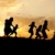 silhouette · groupe · heureux · enfants · jouer · prairie - photo stock © zurijeta
