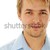 Portrait of an handsome blond man wearing a shirt looking at cam stock photo © zurijeta