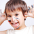 Little cute kid with colors on his face stock photo © zurijeta