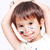Little cute kid with colors on his face stock photo © zurijeta